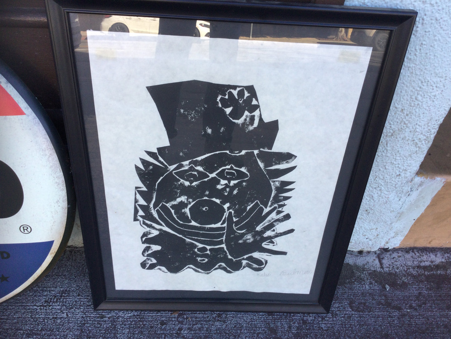 Framed B&W clown signed print