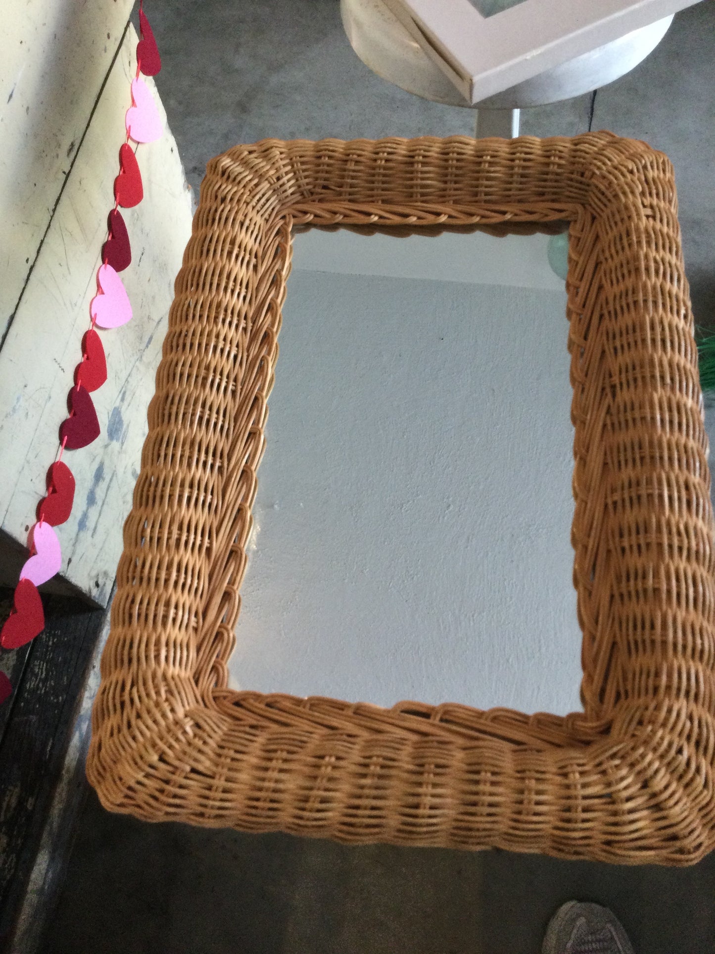 Woven wicker mirror
