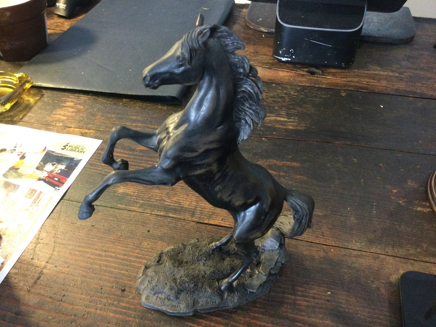 Standing black horse