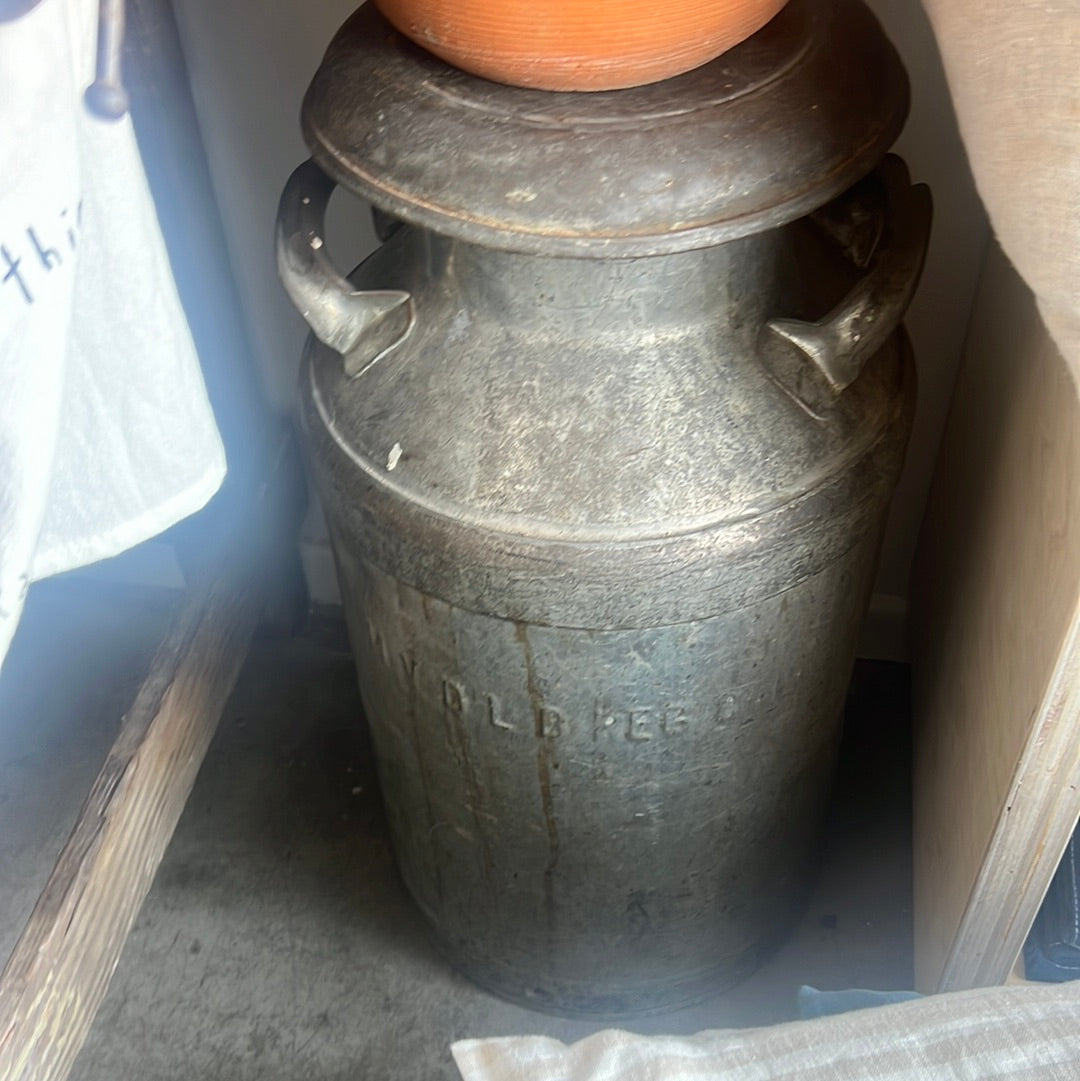 Antique milk can